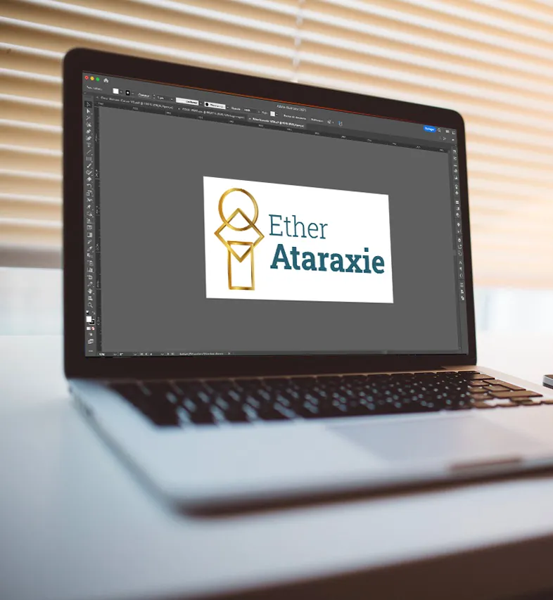 Logo sur écran macbook.
